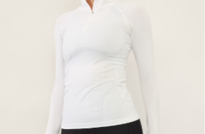 Momentum Seamless Half Zip Body-skimming stretch and zero-slip hem grippers – 43% Off